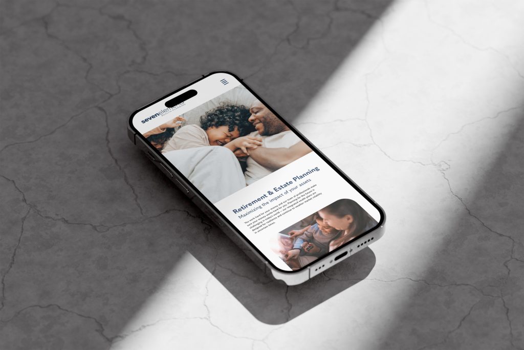 A website mockup on an iPhone screen